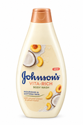Johnson’s Vita-Rich cream-colored body wash bottle with coconut and peach artwork and bronze cap on white background