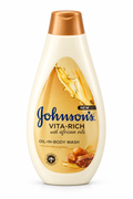 Johnson’s Vita-Rich Oil-in Body Wash cream bottle with gold oil-splash label and bronze cap on white background
