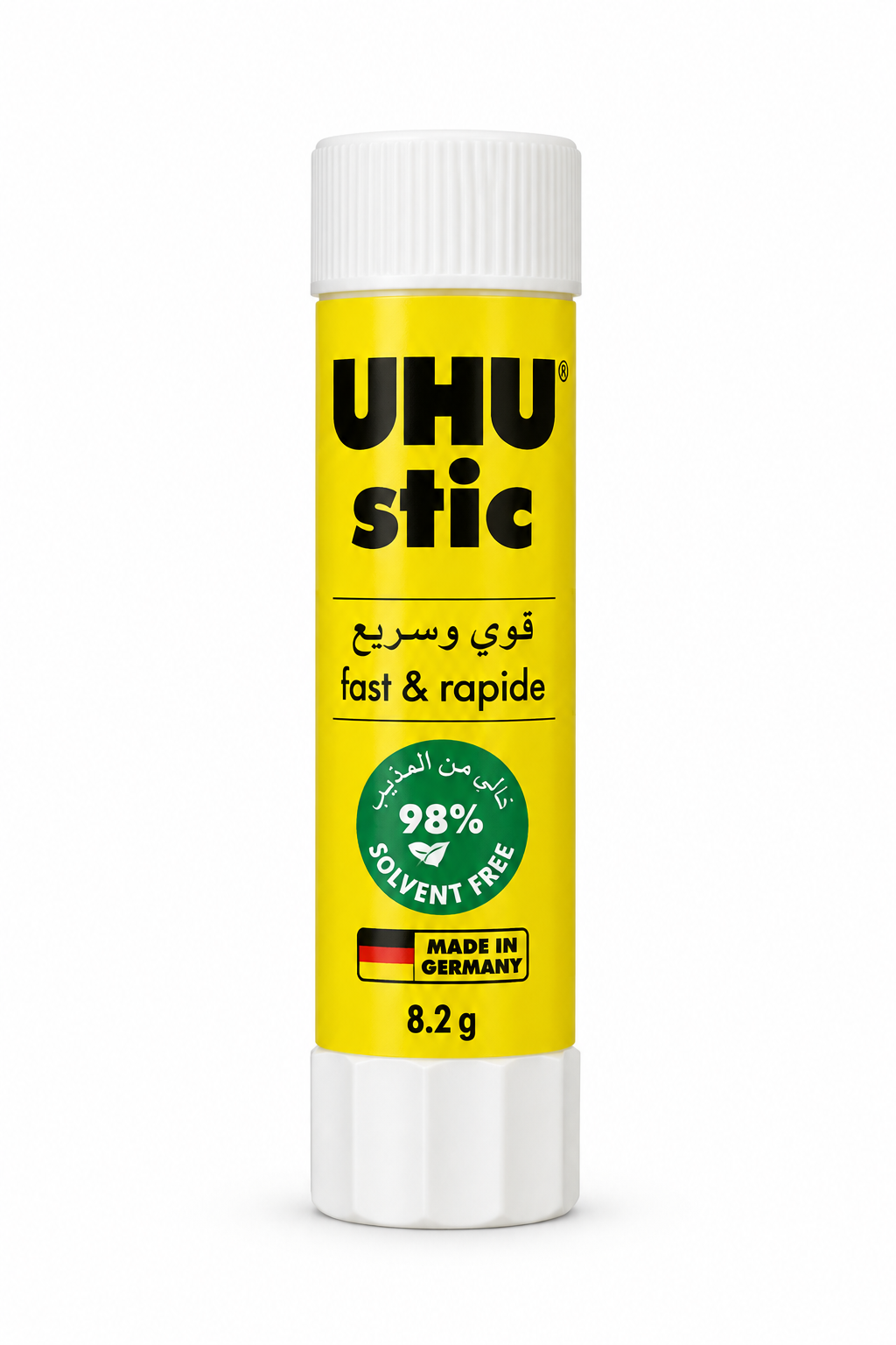 UHU stic 8.2 g yellow glue stick with white cap and twist base on white background