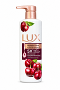 Lux Renewed Glow Warm Cherry 450 ml white bottle with cherry artwork and rose-gold pump on a white background